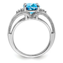 Sterling Silver Rhodium Oval Blue Topaz & Diam. Ring