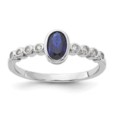 SS Rh-plated .01Created White Sapphire .56Created Blue Spinel Ring