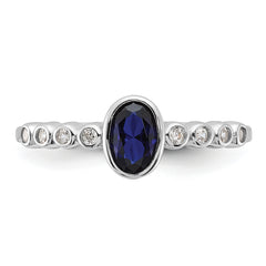 SS Rh-plated  .01Created White Sapphire .56Created Blue Spinel Ring