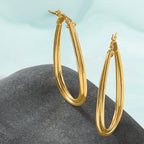 10K Polished Twist Teardrop Hoop Earrings