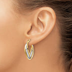 10K w/ White Rhodium Polished Oval Hoop Earrings