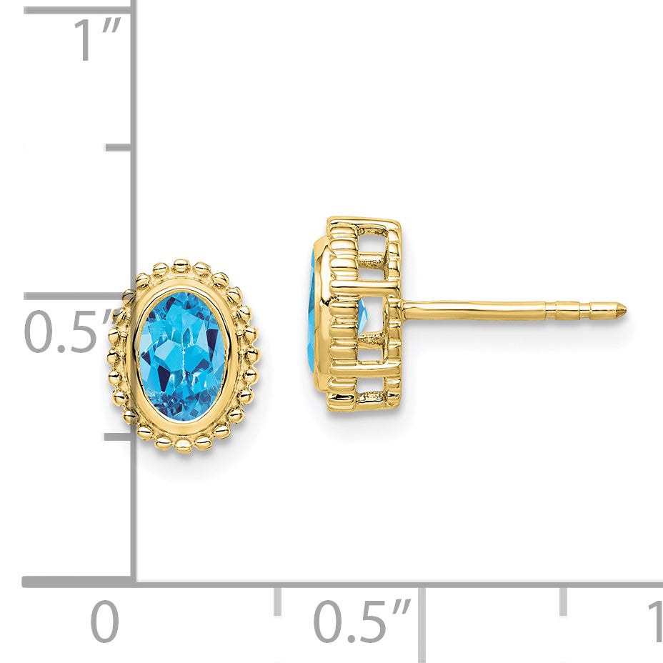 10k Oval Blue Topaz Post Earrings Secondary image
