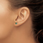 Sterling Silver Rhodium-plated 5x3mm Oval Created Emerald Post Earrings
