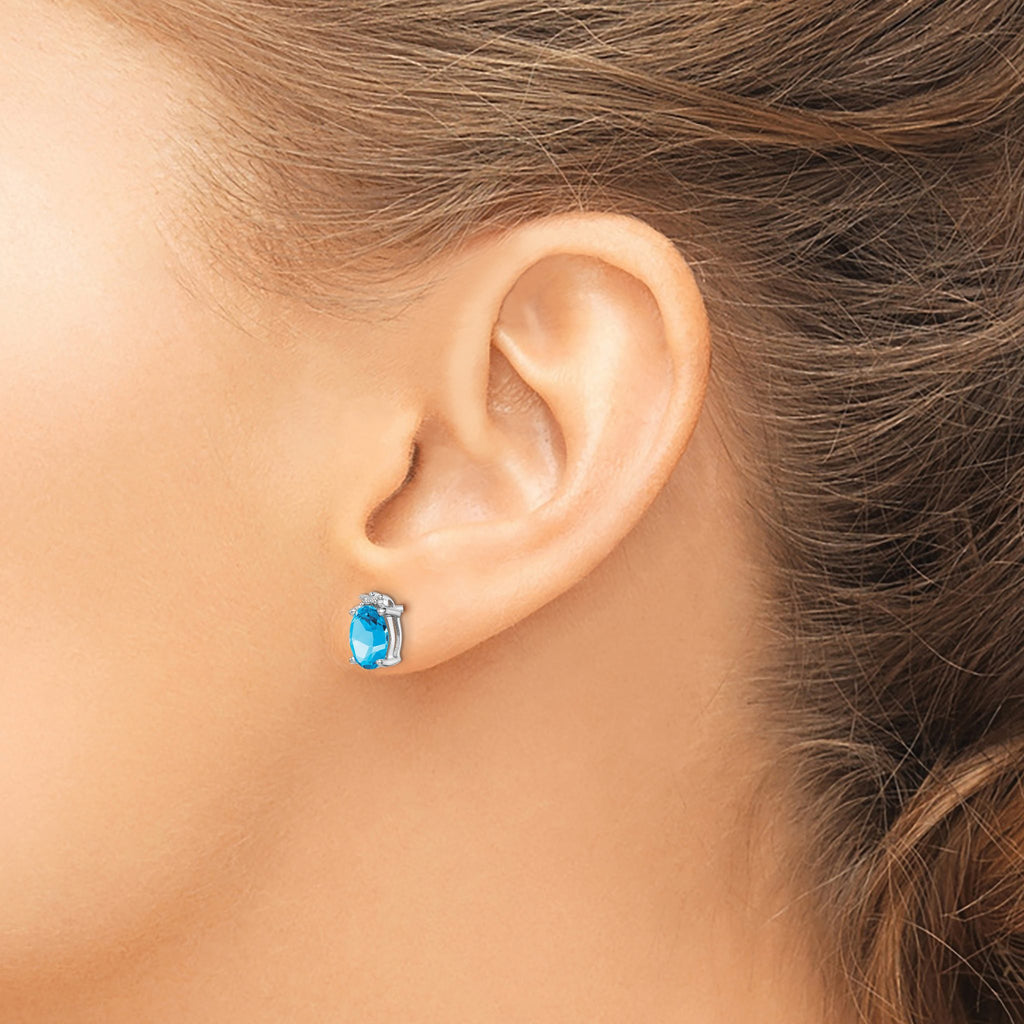 Oval Blue Topaz & Diamond Stud Earrings in Sterling Silver, 8x6mm (0.02 ct. tw.) - Sophia Jewelers