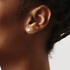 Sterling Silver Madi K Rhodium-plated 4-5mm Pink Round Freshwater Cultured Pearl Post Earrings