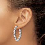 Sterling Shimmer Sterling Silver Rhodium-plated 24 Stone Pear Shaped CZ Fancy In and Out Oval Hinged Hoop Earrings