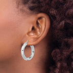 Smooth Octagon Tube Hoop Earrings in Sterling Silver, 30mm Diamond-Cut - Sophia Jewelers