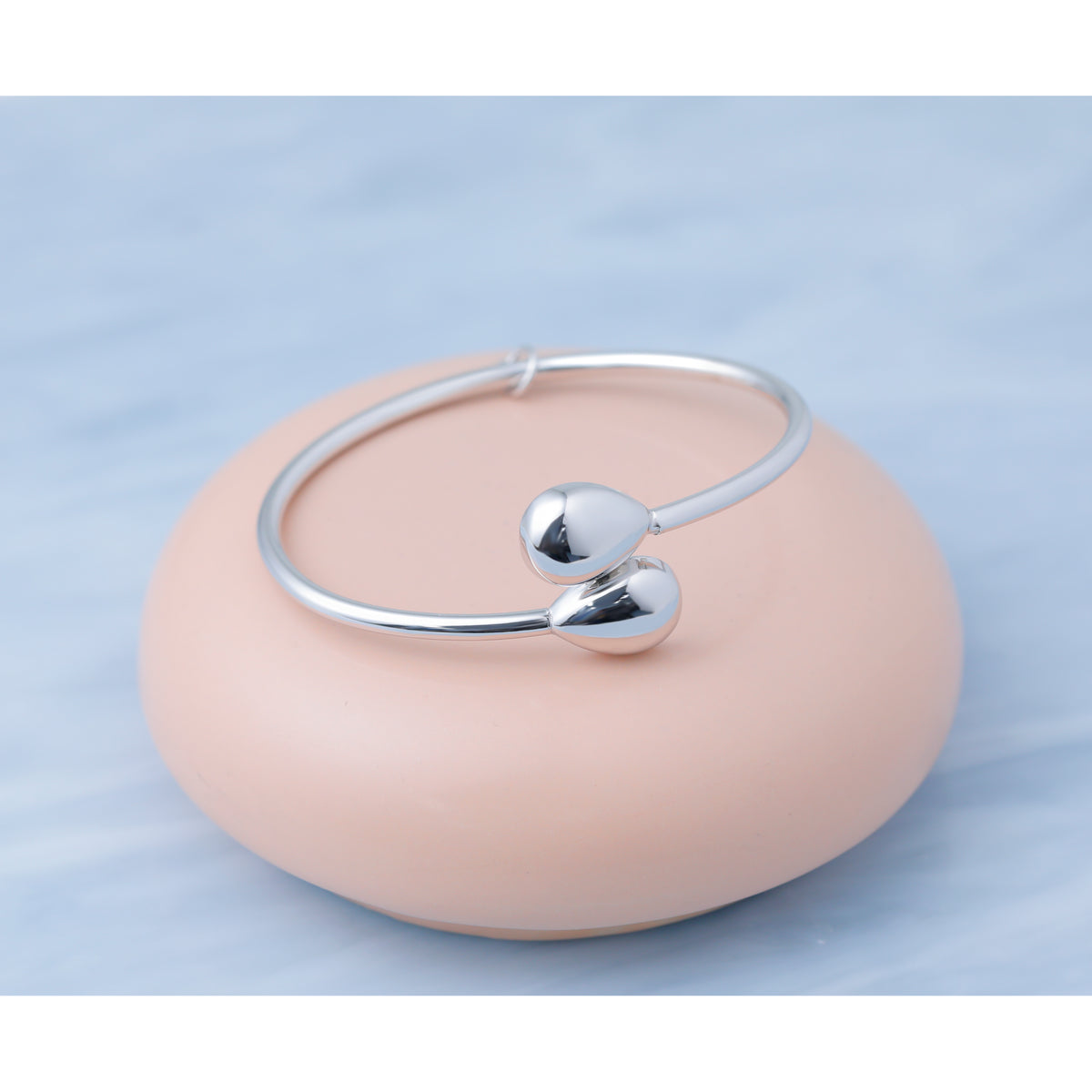 Sterling Silver RH-plated Teardrop accent Flexible Bypass Bangle