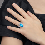 Sterling Silver Rhodium Oval Blue Topaz Ring