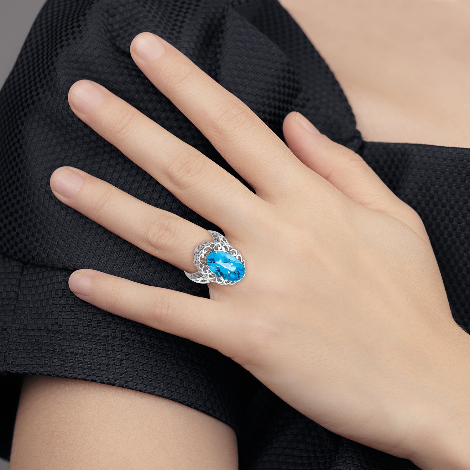 Sterling Silver Rhodium Oval Blue Topaz Ring