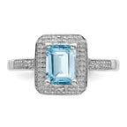 Sterling Silver Rhodium Plated Diamond & Light Swiss Blue Topaz Ring