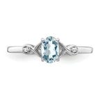 Sterling Silver Rhodium Plated Diamond and Aquamarine Oval Ring
