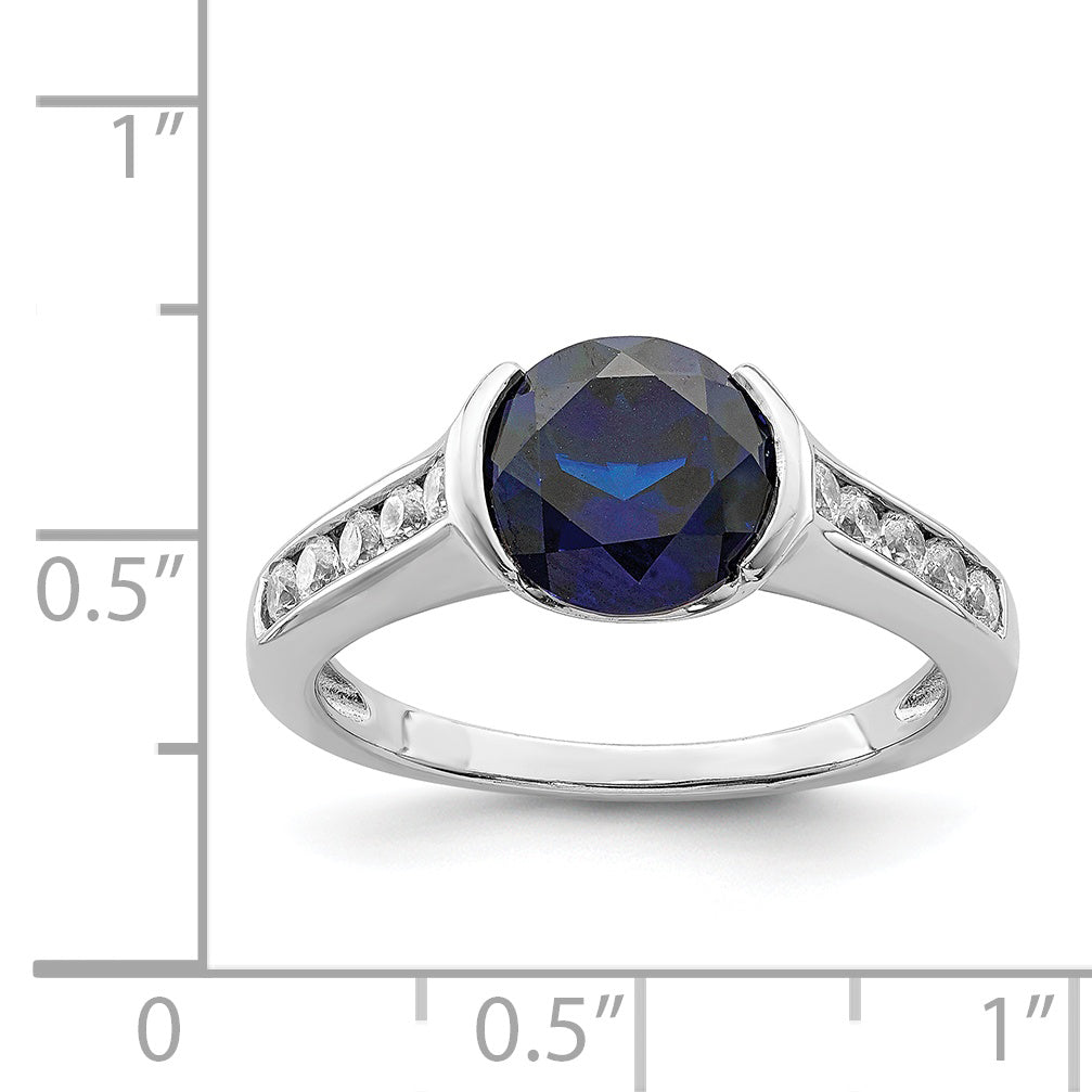 Sterling Silver Rhodium-Plated Synthetic Blue Sapphire and Cubic Zirconi Bezel Ring