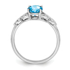 14k White Gold Oval Blue Topaz and Diamond Ring