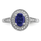 14k White Gold Oval Created Sapphire and Diamond Halo Ring