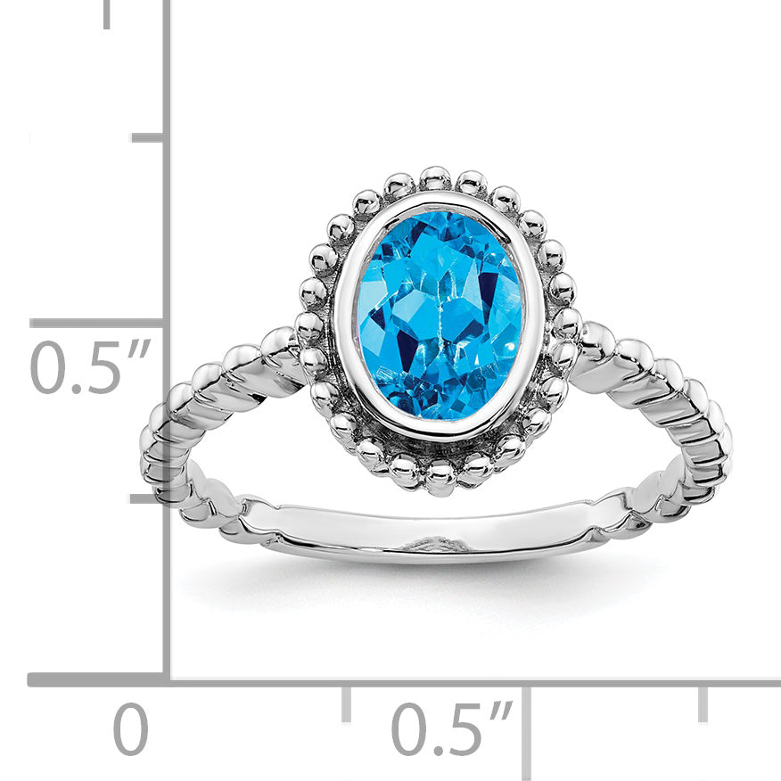 14k White Gold Oval Blue Topaz Ring Secondary image