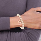 Stainless Steel Polished Rose IP-plated Butterfly 6mm Pink Agate Beaded Stretch Bracelet with Tassel for Women