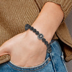 Stainless Steel Antiqued and BrushedCross 8.5mm Lava Stone Beaded Stretch Bracelet