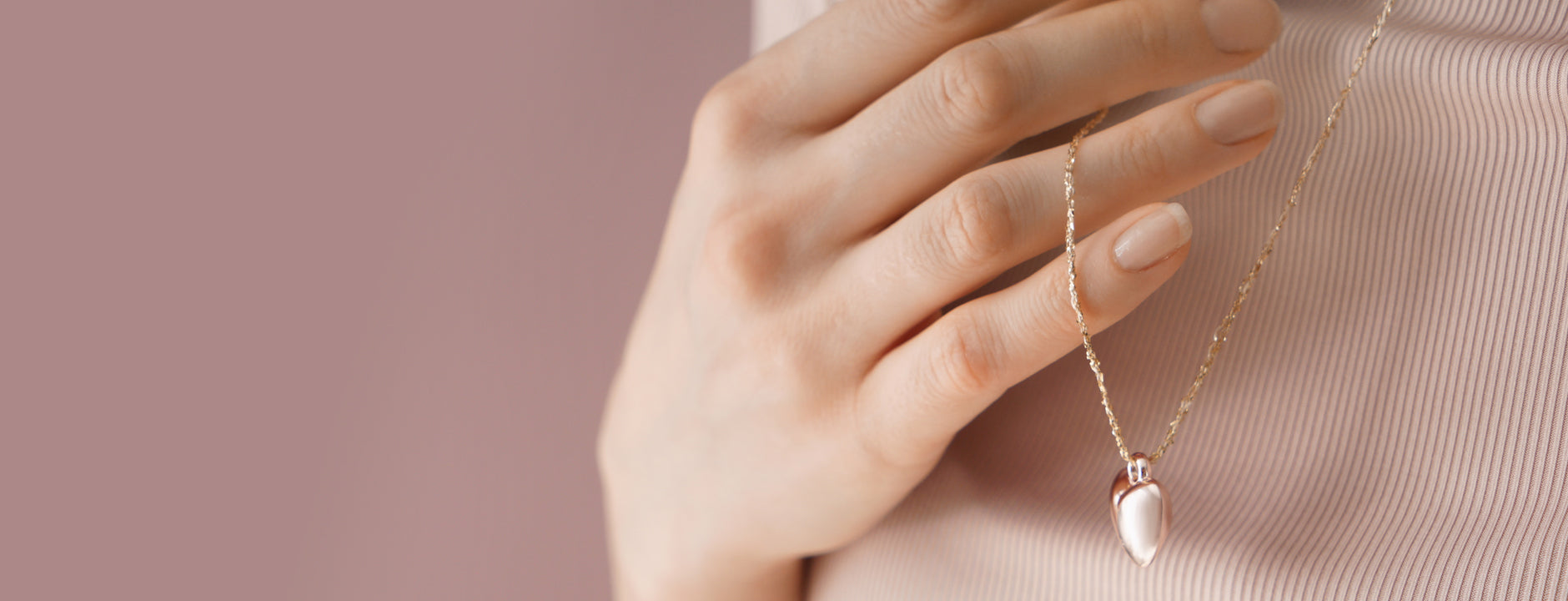 Sophia Jewelers elegant pendant charm, crafted in polished gold, perfect for adding a personalized touch to any necklace or bracelet.