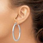 10 Karat White Gold 4mm x 50mm Tube Hoop Earrings - View 3