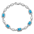 Sterling Silver Rhodium-plated Light Swiss Blue Topaz Link Bracelet
