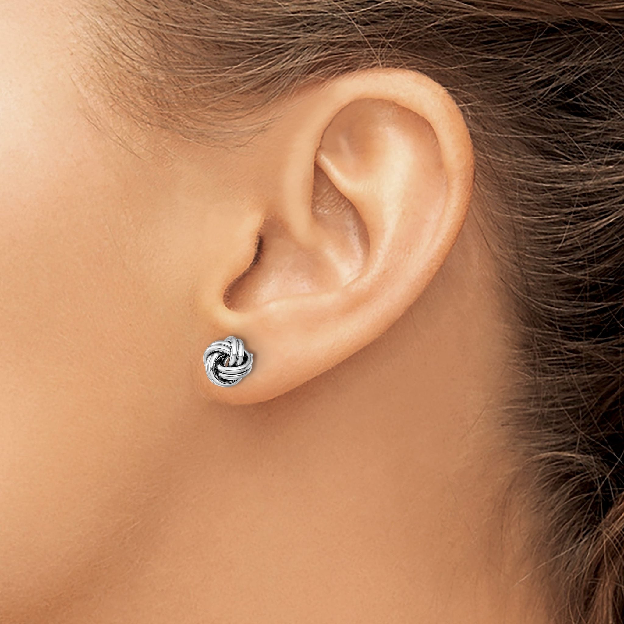 10K w/White Rhodium Polished Love Knot Post Earrings