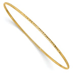 14K Gold Women's Diamond-Cut Bangle Bracelet with Polished Finish Elegant and TimeleSterling Silver Design