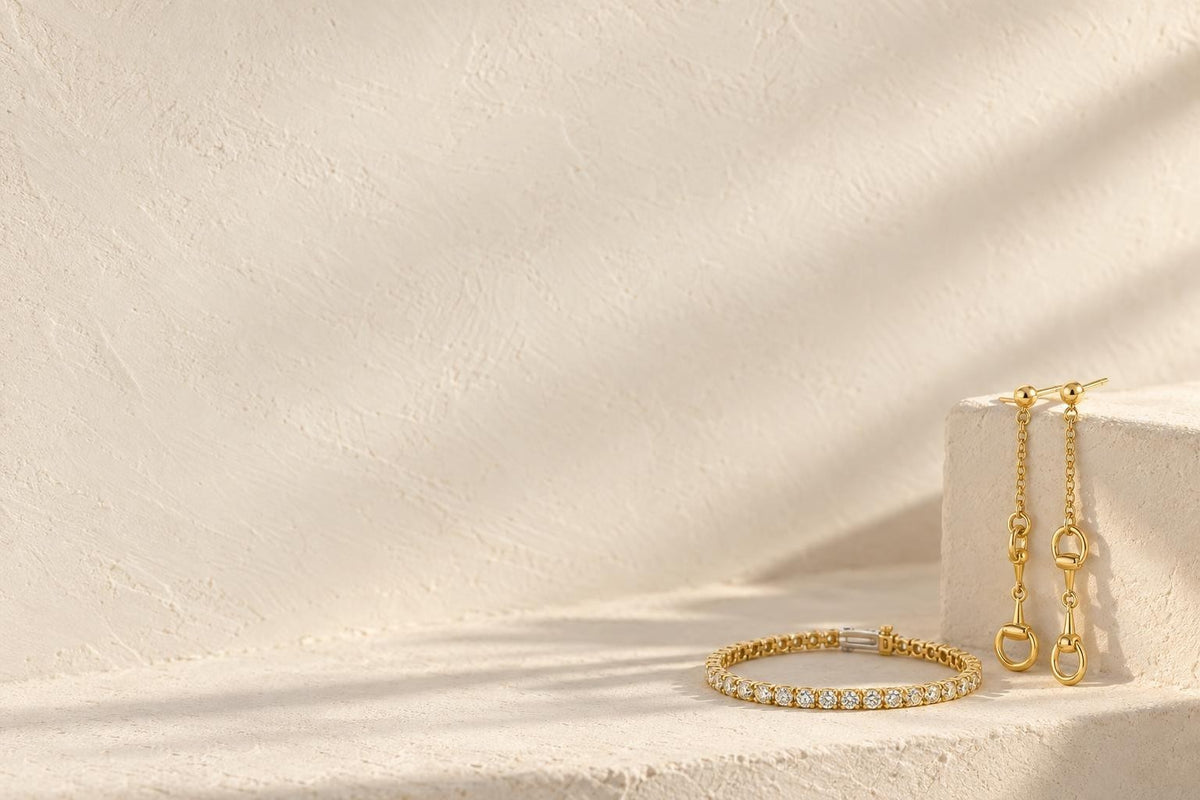 Stirrup link dangle earrings and lab-grown diamond tennis bracelet in 14K yellow gold - Sophia Jewelers