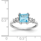 10k White Gold Diamond and Blue Topaz Ring
