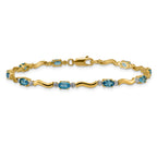 14k Fancy Diamond and Blue Topaz Bracelet