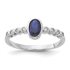 SS Rh-plated  .01Created White Sapphire .56Created Blue Spinel Ring