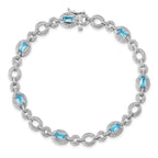 Sterling Silver Rhodium-plated Dia. & Lt Swiss Blue Topaz Oval Bracelet