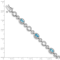 Sterling Silver Rhodium-plated Dia. & Lt Swiss Blue Topaz Oval Bracelet