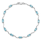 Sterling Silver Rhodium-plated Blue Topaz Bracelet