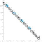 Sterling Silver Rhodium-plated Blue Topaz Figure 8 Bracelet
