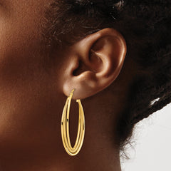 14k Polished and Textured Twisted Fancy Oval Hoop Earrings