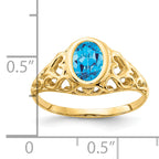 14k 7x5mm Oval Blue Topaz ring