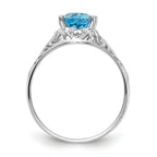 14k White Gold 8x6mm Oval Blue Topaz ring